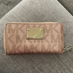 Michael Kors rose gold wristlet